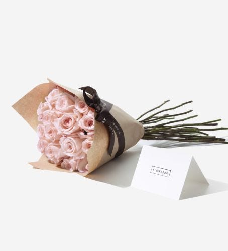 20 Stems of Pink Mondial Rose wrapped in our signature gift wrapping